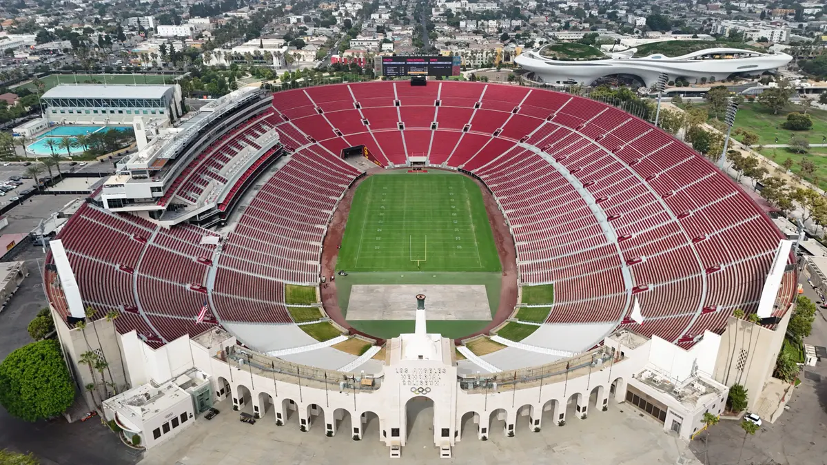 Aerial view of the Los Angeles Memorial Coliseum showing the peristyle arches, the Olympic rings and the cauldron, the venue hosting the 2028 opening and closing ceremonies and athletics