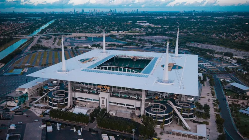 Aerial view of a massive modern stadium showcasing its scale and architecture